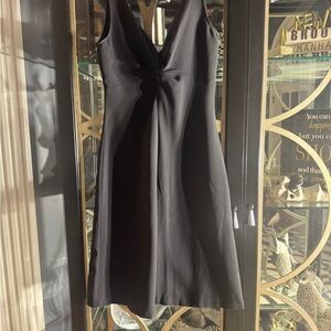 Elegant Black Sleeveless Mini Dress with V-neck for Night Out